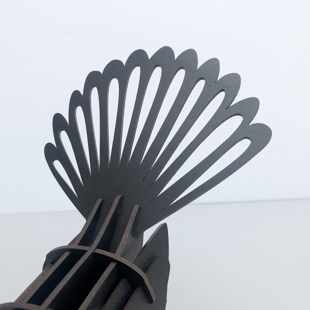 Pīwakawaka Woodenbird