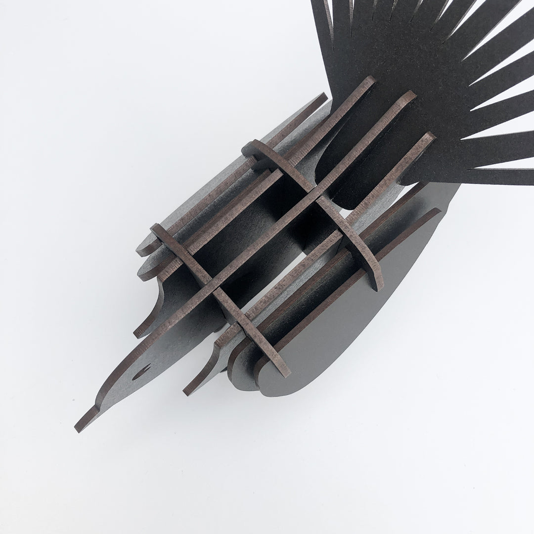 Pīwakawaka Woodenbird