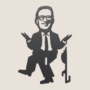 A black silhouette illustration of a man in glasses, suit, and tie sits cross-legged shrugging beside Pūteketeke's Friend by Metalbird New Zealand—an abstract tribute to the Forest & Bird "bird of the century.