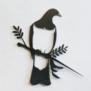 The Metalbird Seconds - PIWAKAWAKA AND BABY - XL by metalbird is a black metal wall art sculpture of birds on a branch. This discounted piece has minor imperfections, making each one unique and perfect for adding character to your decor.
