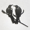 The metalbird Metalbird Seconds - PIWAKAWAKA AND BABY - XL features two birds with white throat tufts on branches. Offered at a discount due to minor flaws, this wall art’s unique design and charm from metalbird remain unaffected.