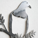 The metalbird Metalbird Seconds - PIWAKAWAKA AND BABY - XL wall art features a unique, imperfect finish in two-tone gray, showing a parent and baby bird on a branch. Enjoy its distinctive charm at a special discounted price.