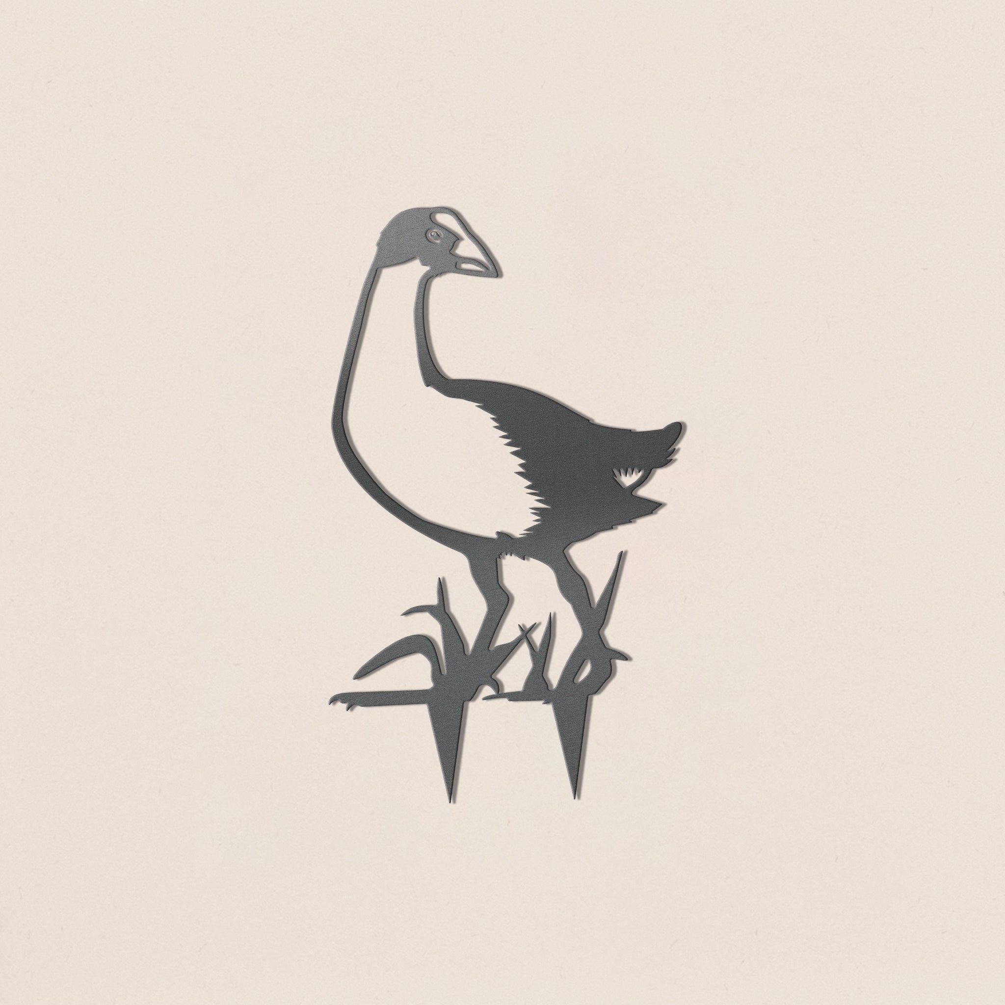 A simple black and white illustration of a pūkeko standing among stylized grass on a plain beige background, inspired by the playful charm of a kiwiana gift from Metalbird New Zealand.